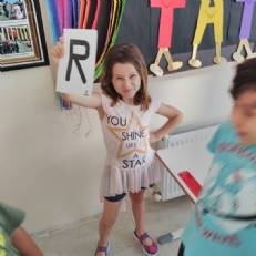 1st graders played game about English alphabet and numbers