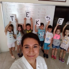 1st graders played game about English alphabet and numbers