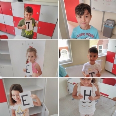 1st graders played game about English alphabet and numbers