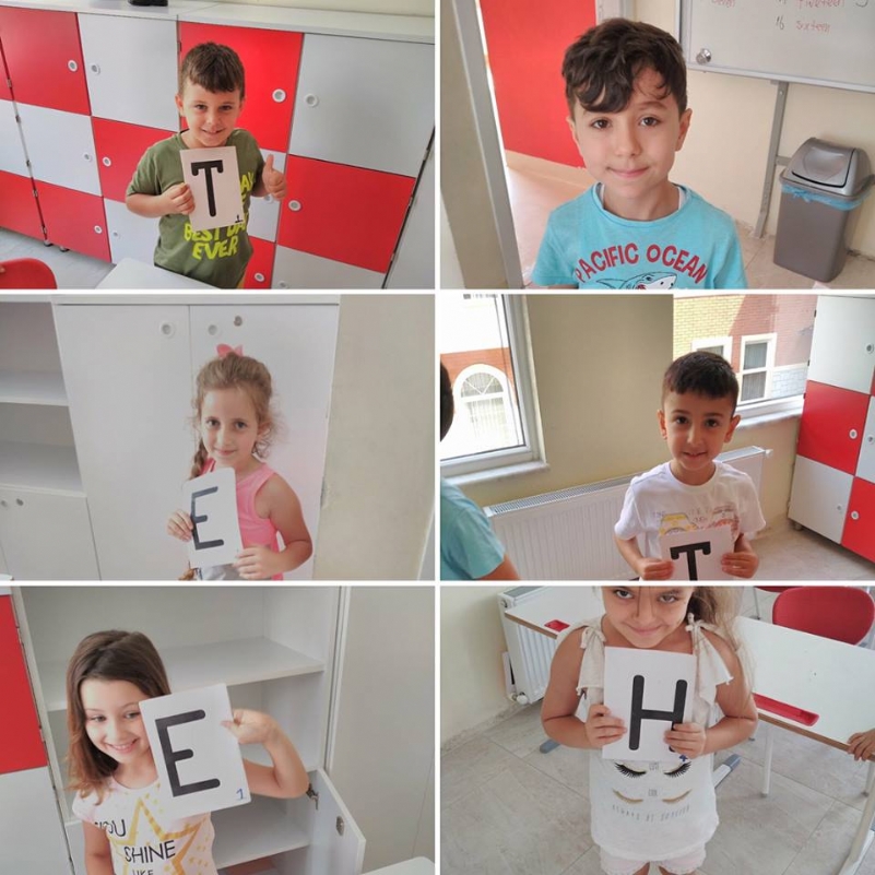 1st graders played game about English alphabet and numbers